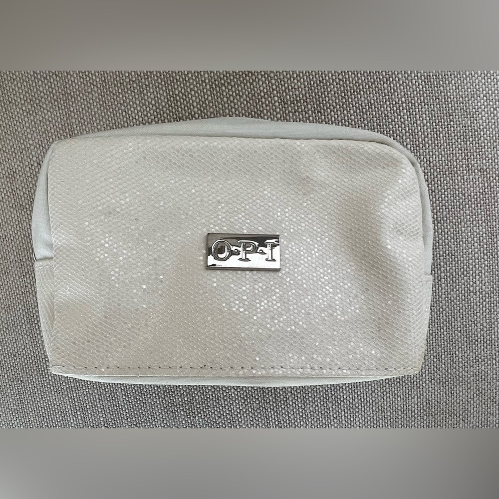 OPI white sparkly small makeup bag / case